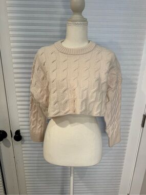 Babaton Cropped Cable-Knit Crewneck Sweater in Light Blush